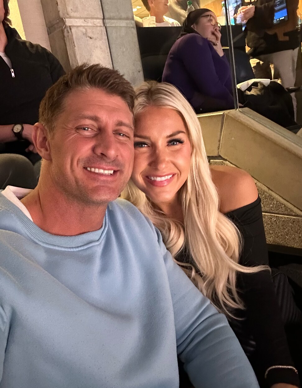 Devin and Summer smiling together during an evening out
